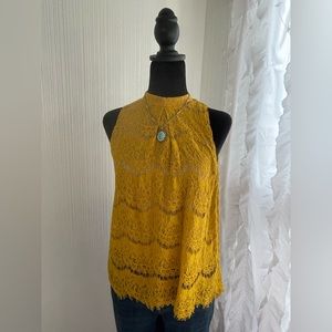 Love, fire sleeveless high neck lined lace top in deep mustard gold